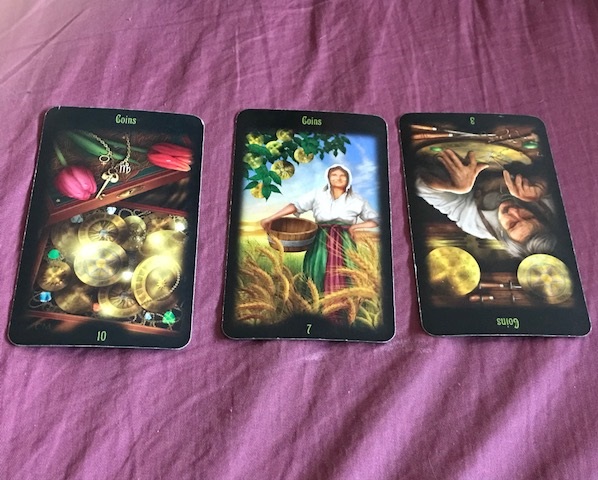 Three Tarot cards