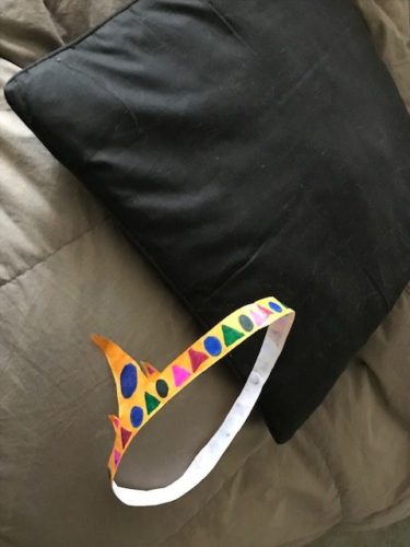 Paper crown falling off pillow